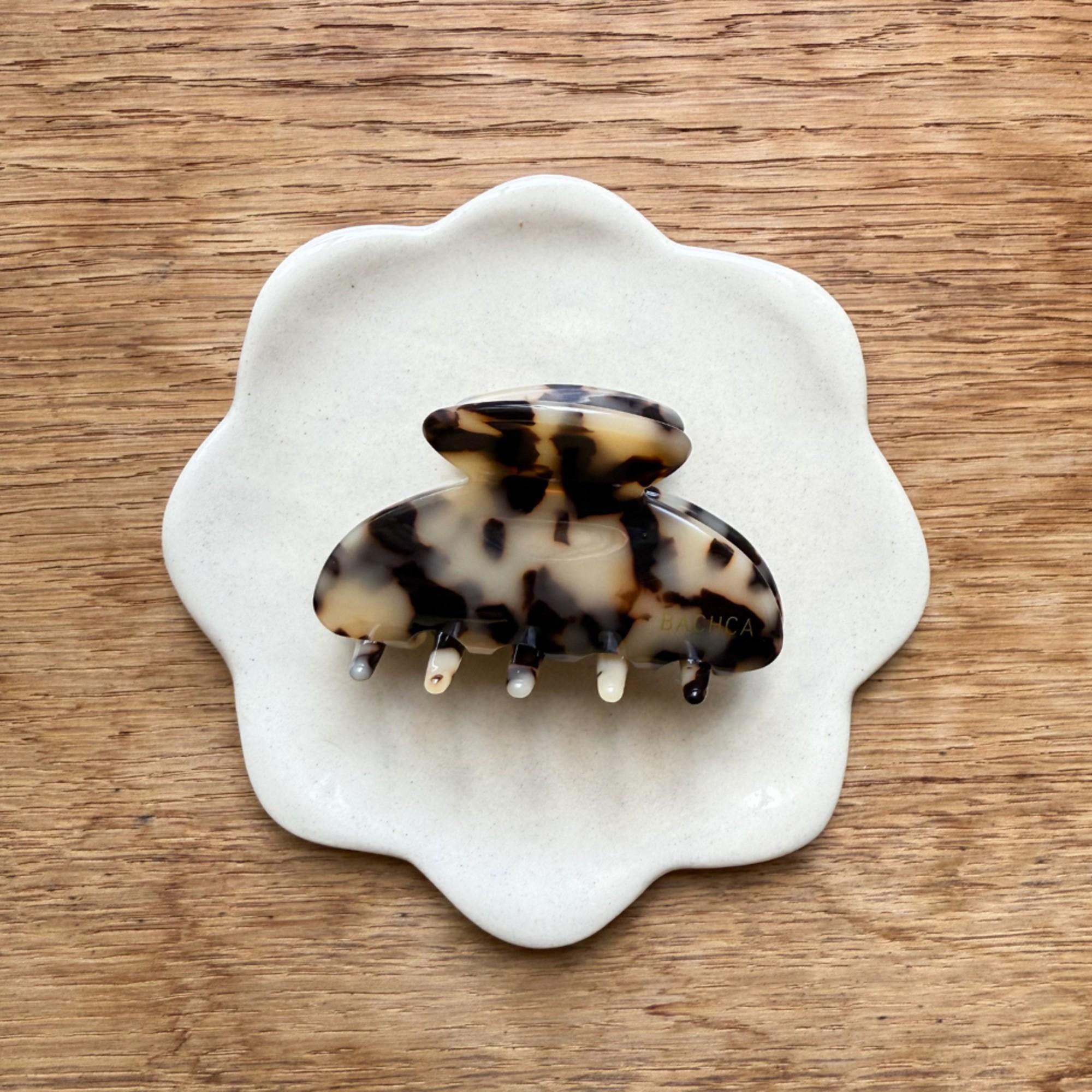 Pince à cheveux en forme de coquillage