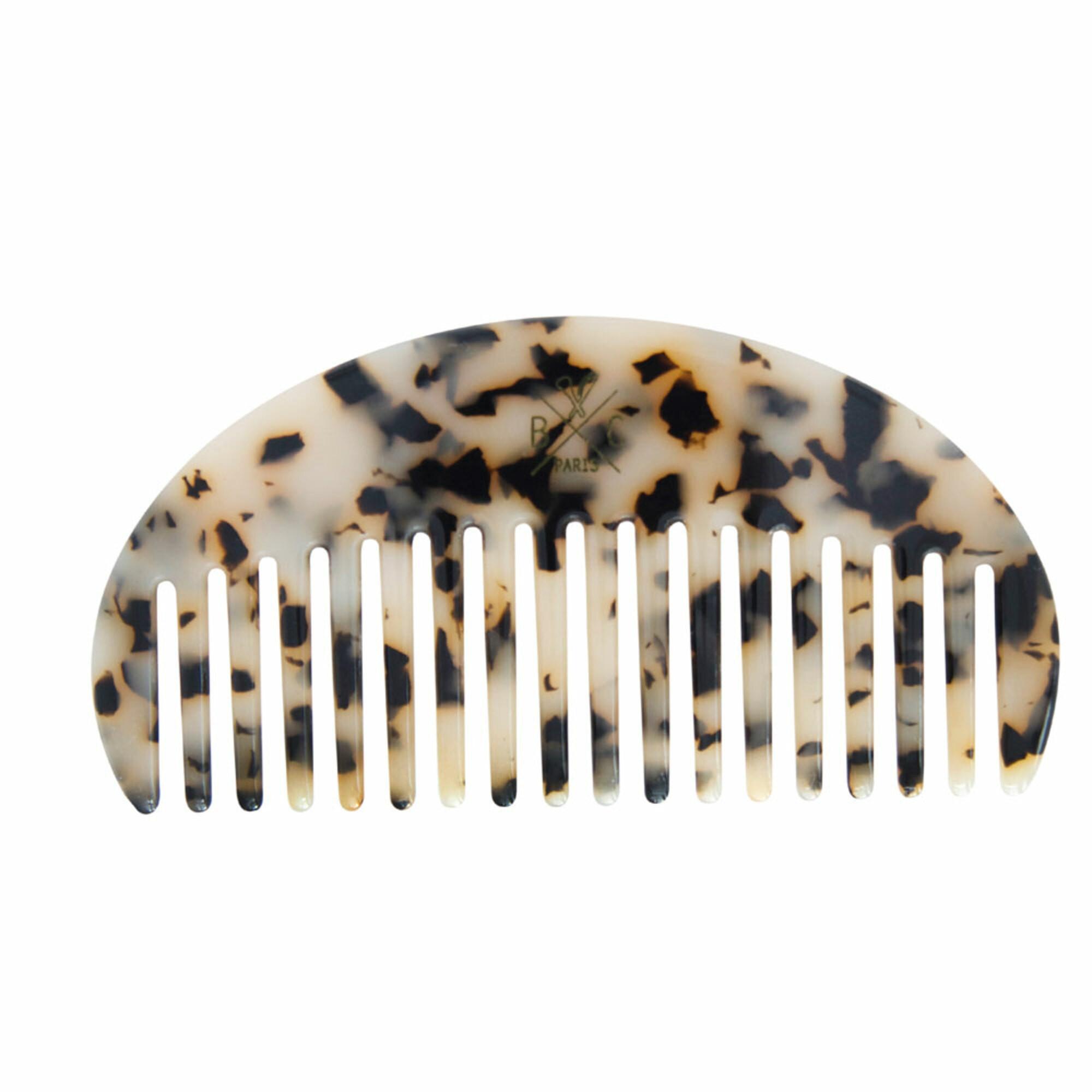 Peigne en forme de coquillage